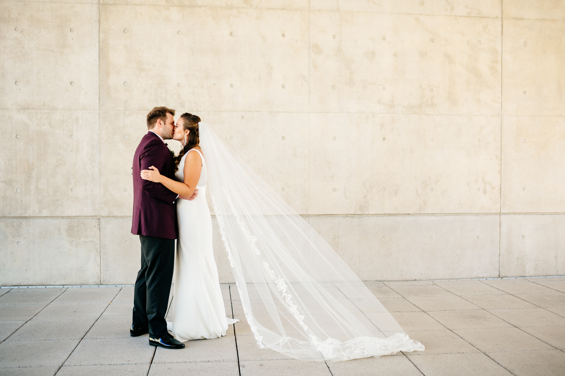 Bride and groom at their modern Grand Rapids Art Museum wedding