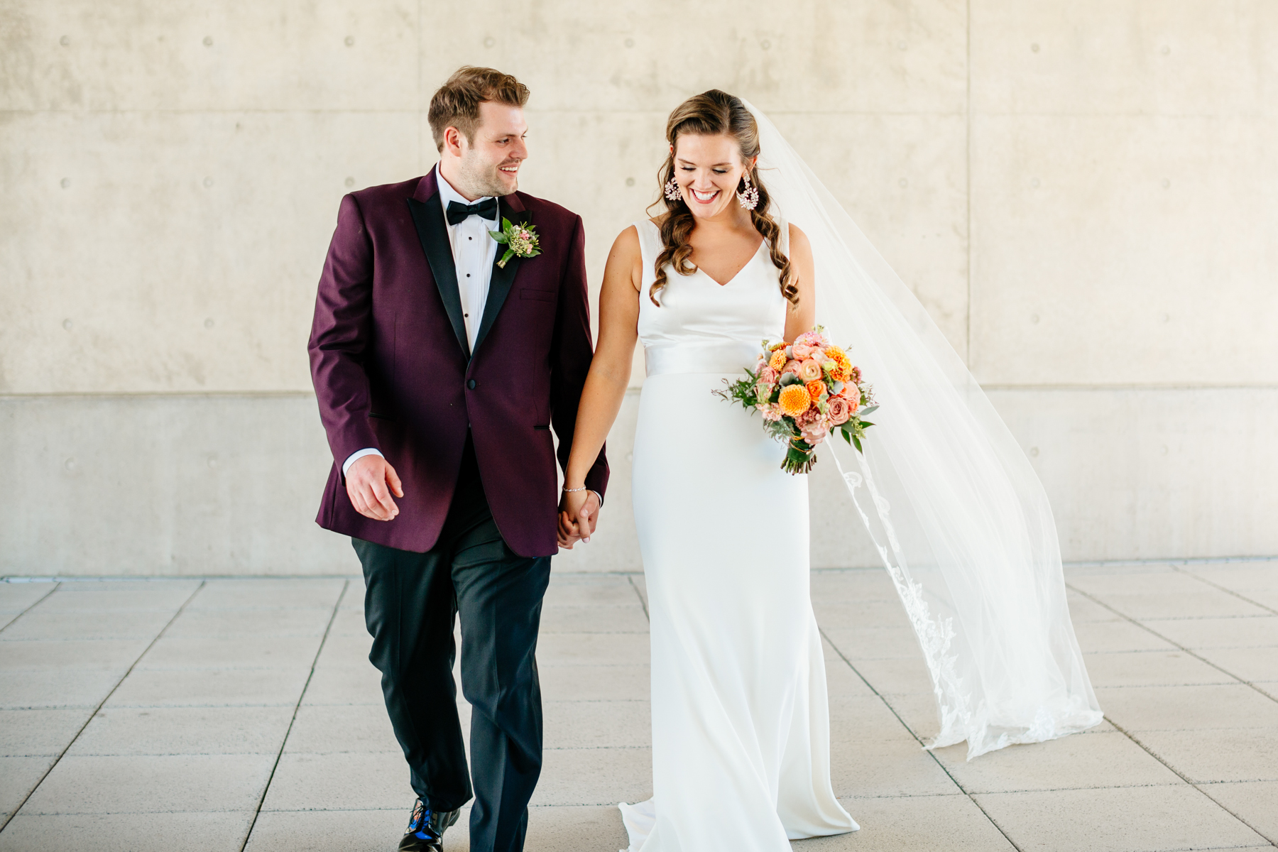 Bride and groom at their modern Grand Rapids Art Museum wedding